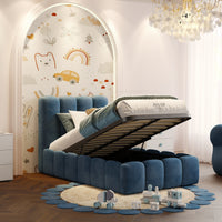 Beth kids ottoman storage bed with rounded upholstered panels and lift-up mattress platform revealing under-bed storage.