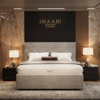 Front view of the Jenna upholstered bed frame in warm taupe with a framed geometric panel headboard and plain low footboard.
