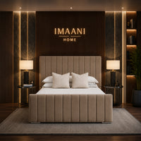 Marlowe taupe upholstered bed with vertical channel headboard and matching padded panel footboard.