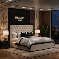 Mirren cream Chesterfield bed with diamond button-tufted upholstered headboard, black frame detail and plain padded bed base.