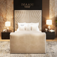 Orianna cream upholstered bed frame with tall fan-panel headboard and deep padded footboard with concealed TV housing.